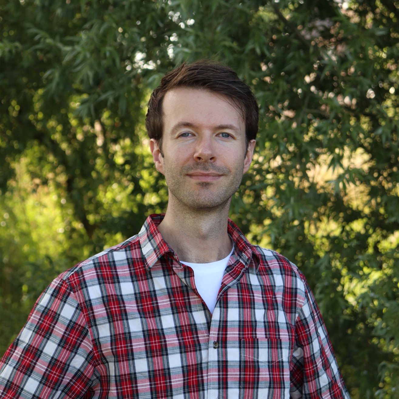 Een portretfoto van David van Vugt